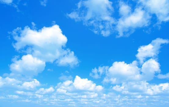 Blue sky background with a tiny clouds