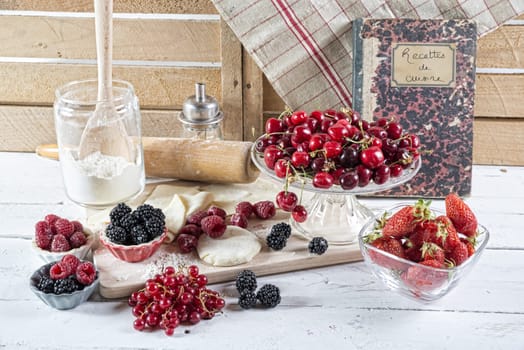 preparation for cake with red fruit with dough