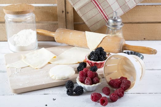 preparation for cake with red fruit with dough
