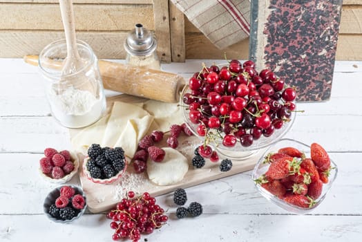 preparation for cake with red fruit with dough