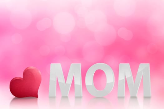 White 3D MOM text with heart shape over pink background
