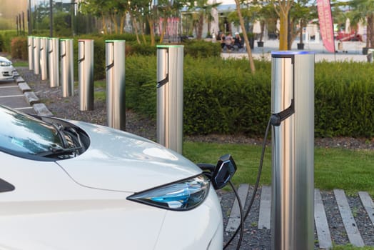 METZ, FRANCE - AUGUST 12, 2016: Renault electric car plugged in at a charging point