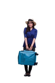 Beautiful asian woman tourist with blue suitcase standing isolated over white background