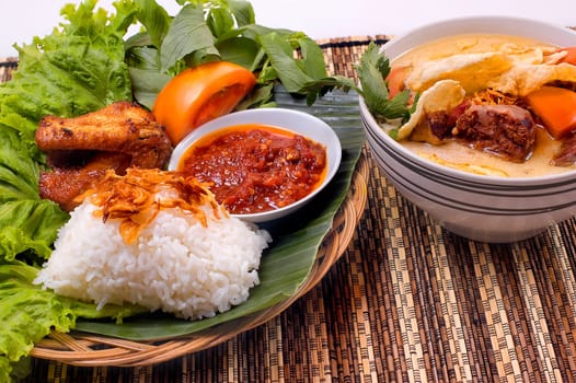 Indonesian traditional food, fried chicken and oxtail soup