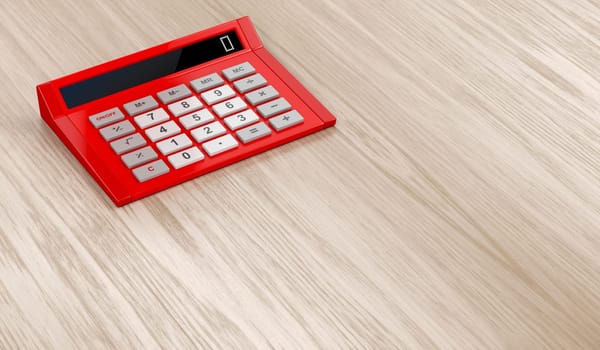 Red calculator on wooden table