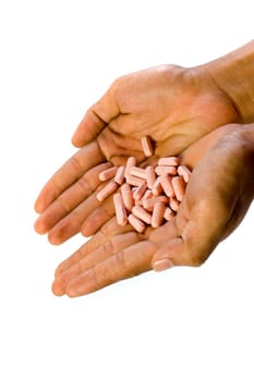 A lots of tablets in man's two hands on white background