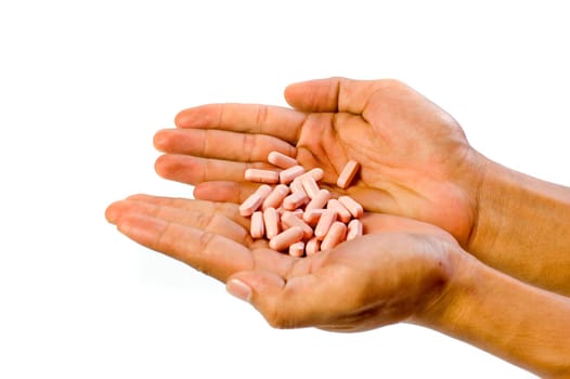 A lots of tablets in man's two hands on white background