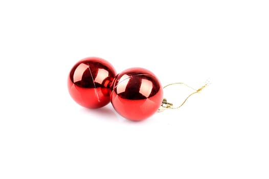 Two red christmas balls isolated on white background