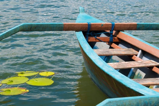 Colourful traditional Balinese fishing boat on the water