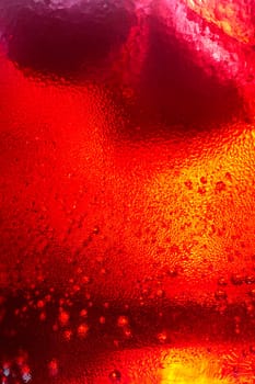 Red Soda Drinks with ice cube in the glass