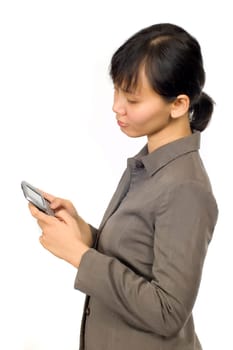 Pretty Asian Woman, text on her cellpone with sad face