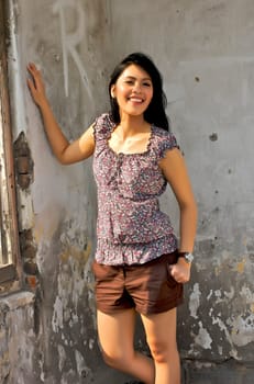 Portrait of Beautiful Asian Woman at Old Building Outdoor