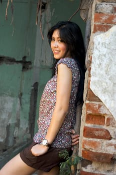 Portrait of Beautiful Asian Woman at Old Building Outdoor