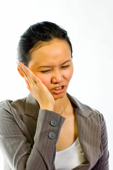 Asian woman stress and hold her cheeks on white background