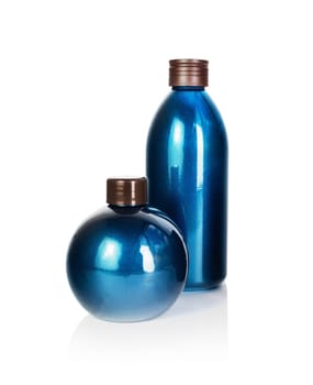 Blank cosmetic bottles on white background. Beauty product mock up. Isolated with clipping path.