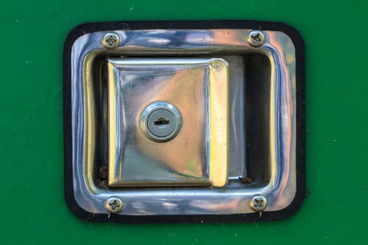 Close up of old keyhole in round lock