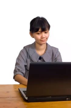 Asian business woman smile and using laptop on white background