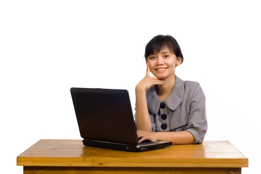 Asian business woman smile and using laptop on white background