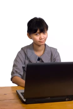 Asian business woman smile and using laptop on white background