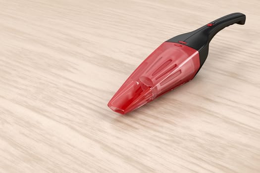Portable vacuum cleaner on wooden table