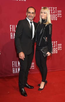 Navid Negahban and Nina Sangunish ,. Opening of the Filmfest at the Cinemaxx Kino Hamburg