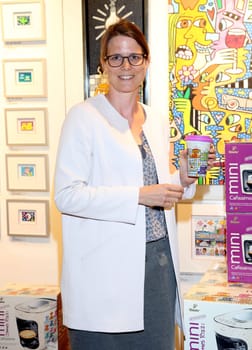 Kristina Koelling,  ( Tchibo) .PopArt designt Kaffee Traeume ! .Cafissimo Mini im Design James Rizzi offiziell in der Galerie Walentowski , Europapassage vorgestellt Launch-Event  JAMES RIZZI Cafissimo MINI - Limited Edition by Tchibo" in Hamburg."