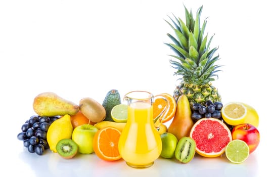 Assortment of exotic fruits and juice on white background.