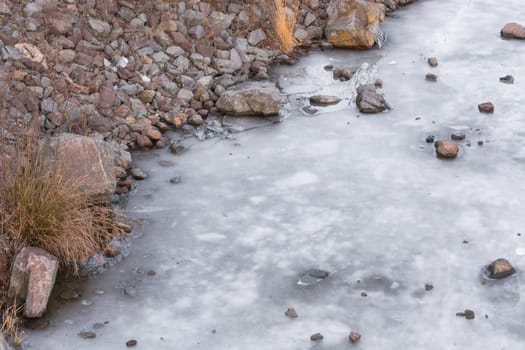 Frozen water surface of a river. The river Ruhr in the city of Essen Kupferdreh..