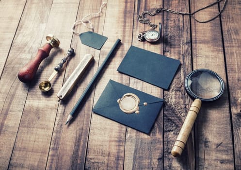 Vintage still life. Stationery set on wood background. Responsive design mockup for placing your design.