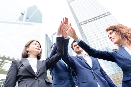 Group of business people joining hand together