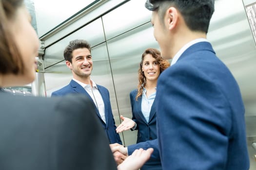 Group of business people discuss to each other