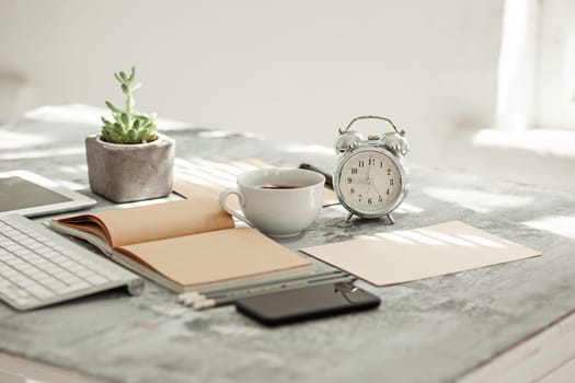 Office desk table with computer, supplies and mobile phone