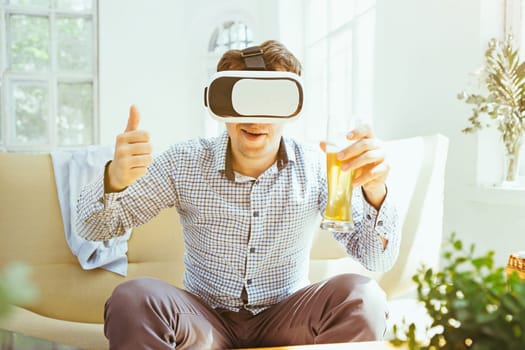 The man with glasses of virtual reality at home. Future technology concept.