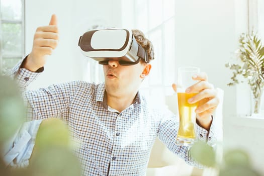 The man with glasses of virtual reality at home. Future technology concept.