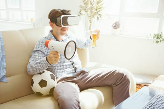 The man with glasses of virtual reality at home. Future technology concept.