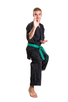 Martial arts student isolated in a white background