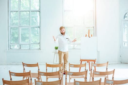 Speaker at Business Meeting in the empty conference hall. Business and Entrepreneurship concept.