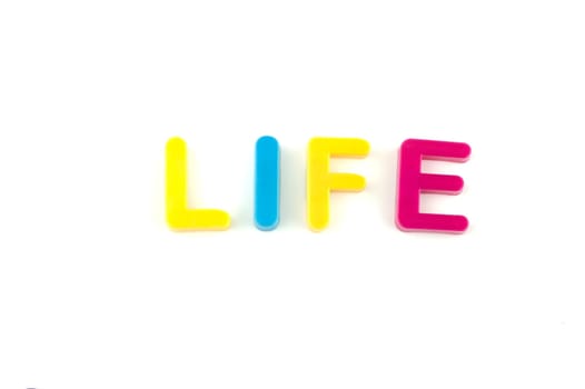 Word life isolated on white background made from colorful toys letters