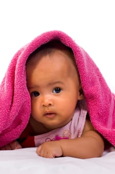 Cute baby in the towel on white background