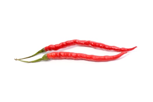 Two Red Hot Chili Peppers on White Background
