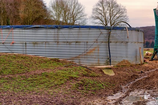 Round feed silo or grain silo made of metal..