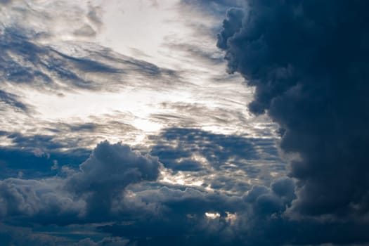Gray storm clouds before sunset
