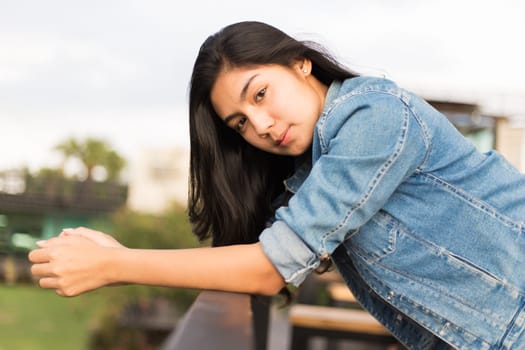Beautiful young Asian woman in the cafe
