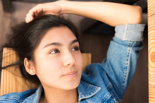 Beautiful young Asian woman in the cafe