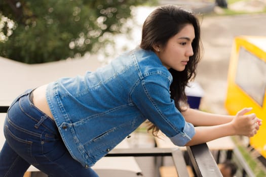 Beautiful young Asian woman in the cafe