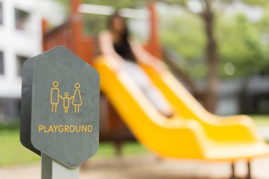 Children playground, yellow blue slider