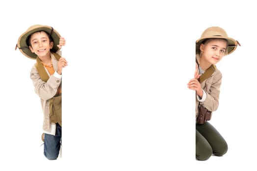 Young couple playing Safari isolated in white