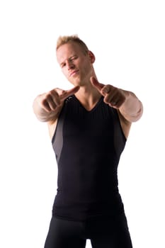 Fit male model with a lot of confidence smiling and pointing fingers to camera on white background