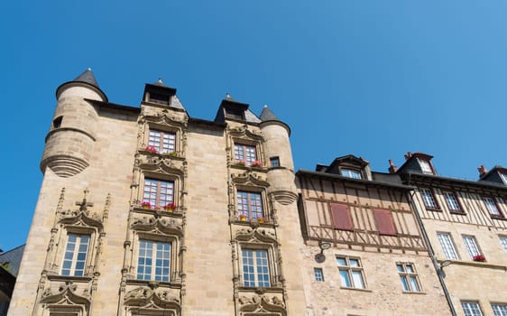 typical facades of french houses in a small village named Tulle