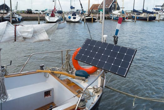 modern sailing yacht with solar panel on the bow